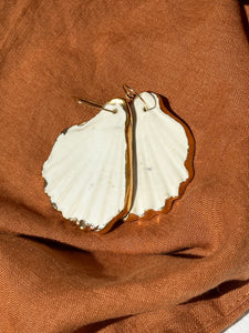 White + gold shell earrings